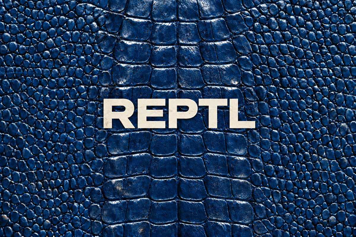 REPTL in warm off-white lettering over a deep navy reptile scale texture